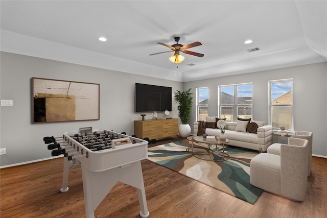 living area featuring visible vents, recessed lighting, ceiling fan, and wood finished floors