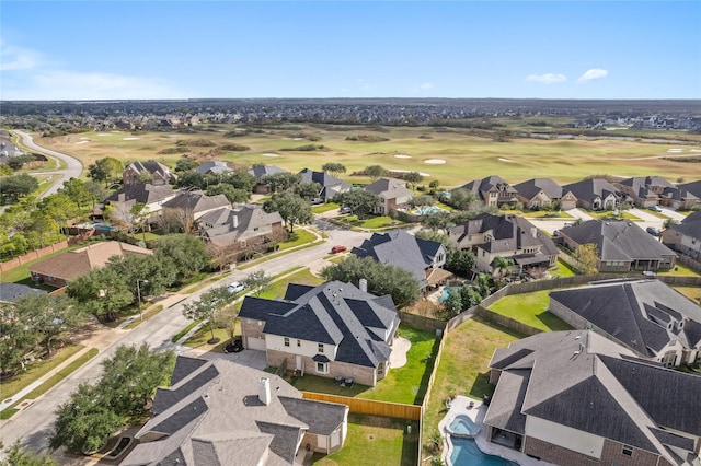 birds eye view of property with a residential view