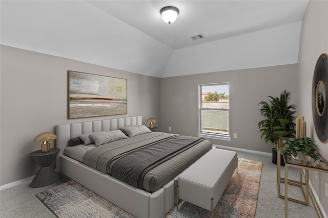 bedroom featuring vaulted ceiling, carpet, visible vents, and baseboards