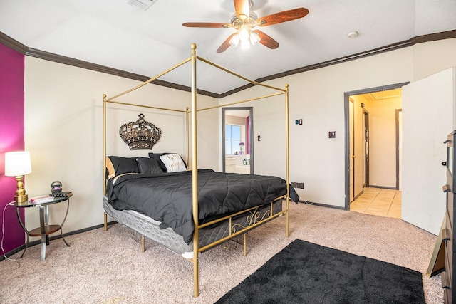 carpeted bedroom featuring ceiling fan, baseboards, and ornamental molding