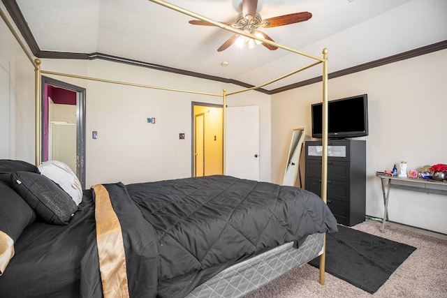 carpeted bedroom with crown molding and lofted ceiling