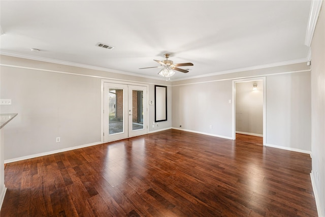 empty room with baseboards, wood finished floors, and a ceiling fan