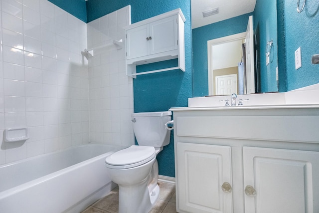 full bathroom with vanity, visible vents, tile patterned flooring, toilet, and a textured wall