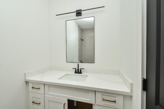 bathroom featuring vanity and walk in shower