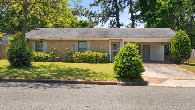 827 Scarlet Oak St, Nacogdoches, TX 75964 - ranch-style house with concrete driveway, a carport, and brick siding