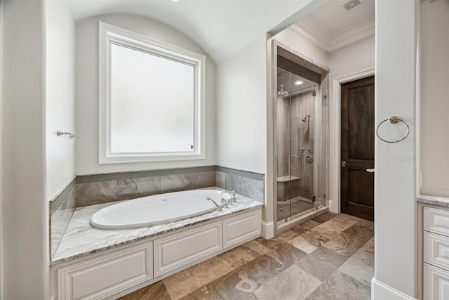 full bath with visible vents, a stall shower, ornamental molding, and a bath