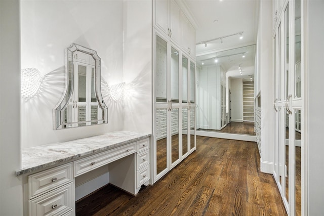 corridor featuring dark wood-style floors