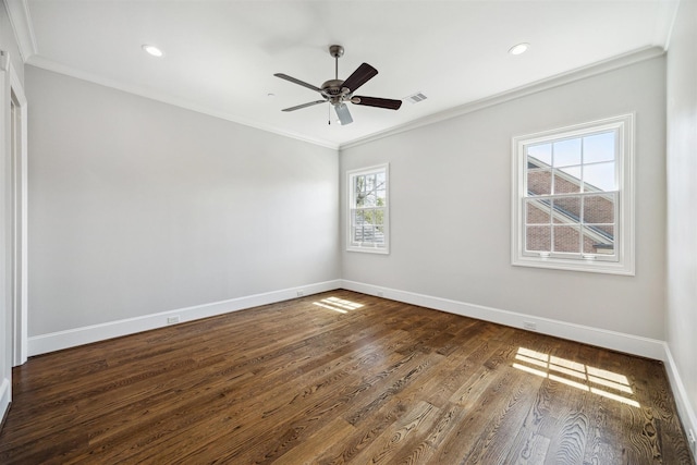 unfurnished room featuring crown molding, baseboards, dark wood-style flooring, and ceiling fan