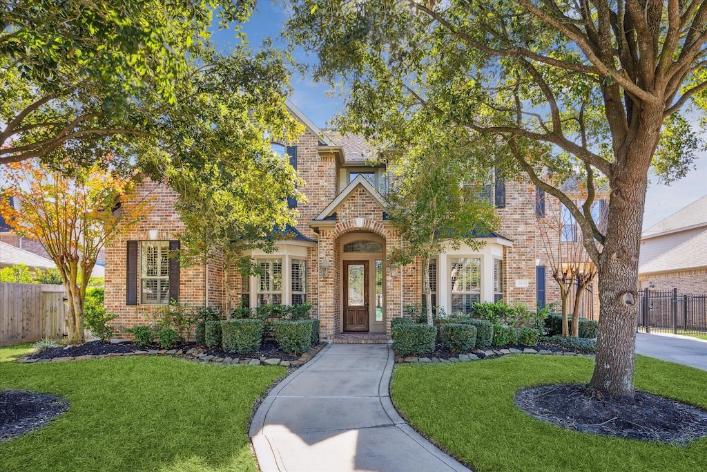 25311 Madison Falls Ln, Katy, TX 77494 - view of front facade with brick siding