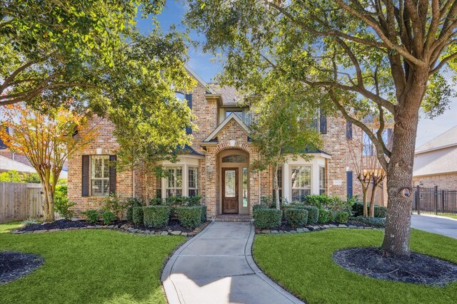 25311 Madison Falls Ln, Katy, TX 77494 - view of front facade with brick siding