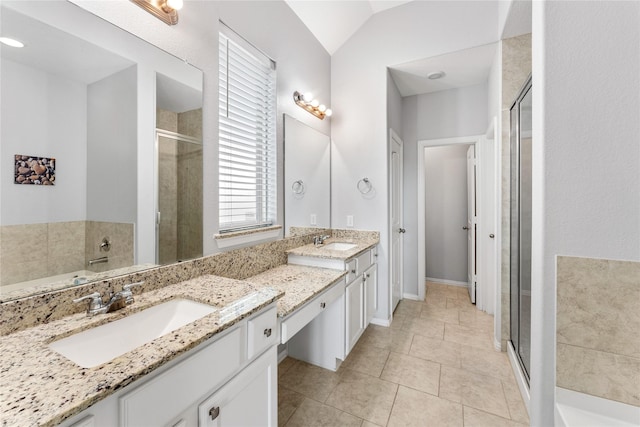 full bath with vanity, a stall shower, tile patterned flooring, vaulted ceiling, and a bathtub