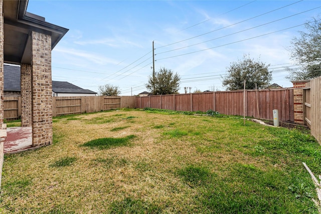 view of yard featuring a fenced backyard