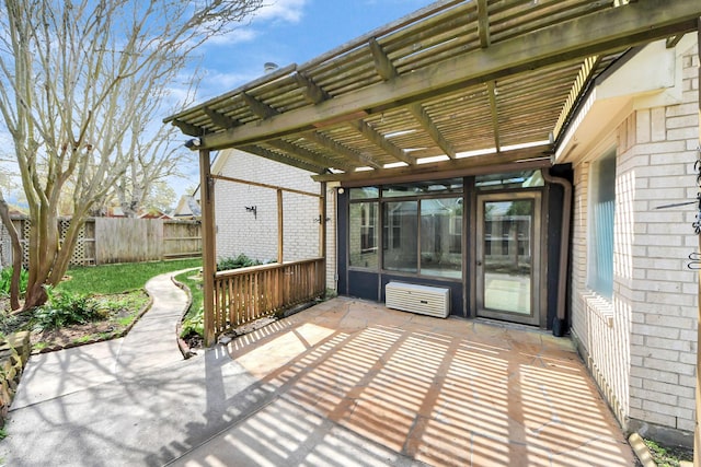 view of patio / terrace with fence and a pergola