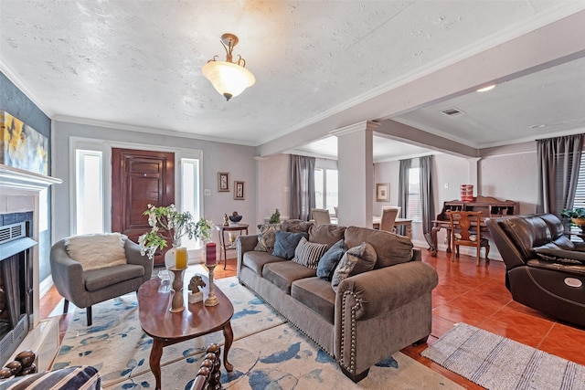 living room with a textured ceiling, light tile patterned flooring, a fireplace, and crown molding