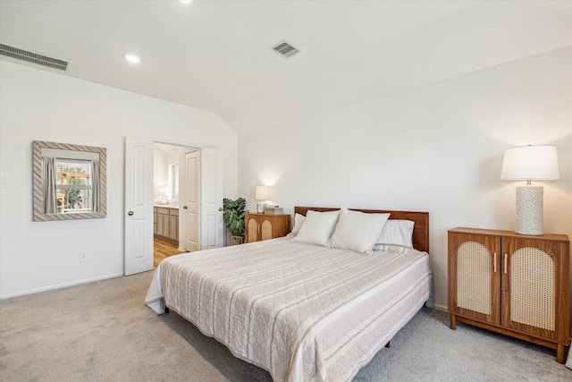 bedroom featuring recessed lighting, visible vents, light colored carpet, and vaulted ceiling