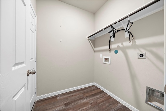 clothes washing area with baseboards, washer hookup, laundry area, dark wood-style floors, and hookup for an electric dryer