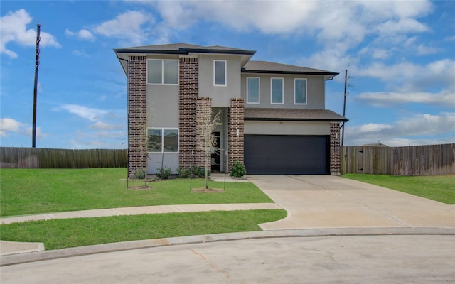 view of front facade featuring stucco siding, driveway, fence, a front yard, and a garage