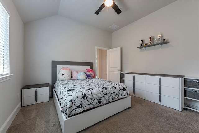 bedroom with visible vents, a ceiling fan, carpet, and vaulted ceiling