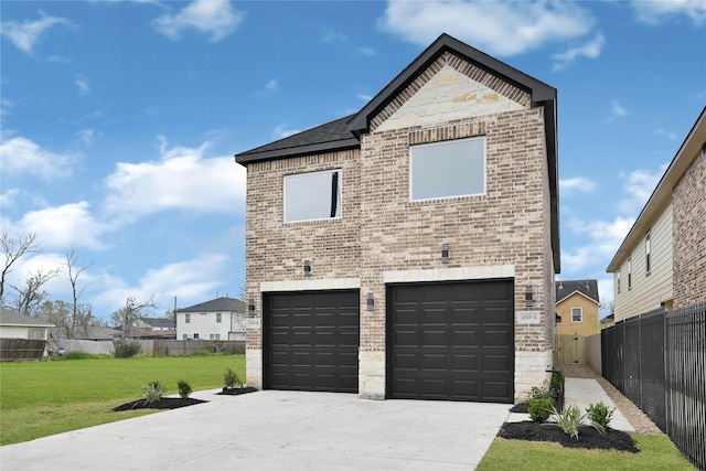 exterior space with a front yard, concrete driveway, fence, and brick siding