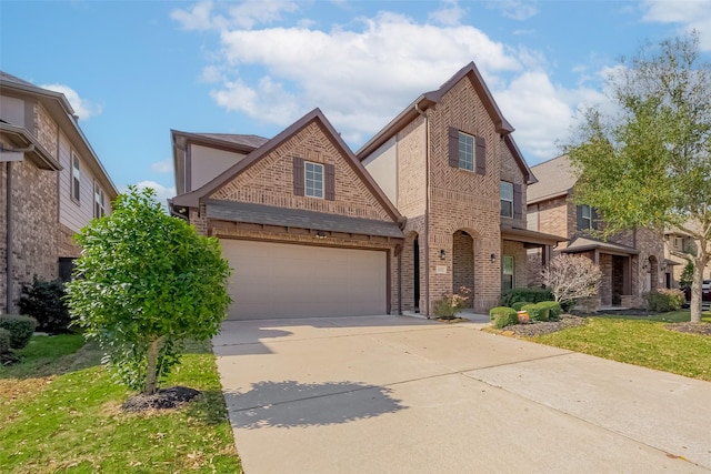 view of front of property with a garage, brick siding, and driveway