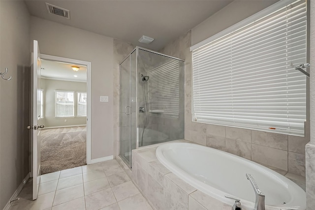 full bathroom with tile patterned floors, visible vents, a shower stall, and a garden tub