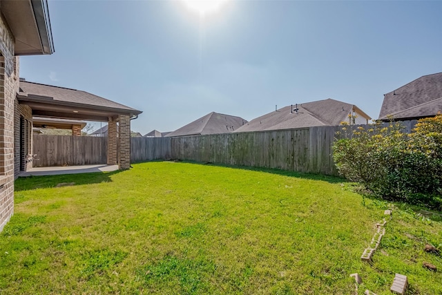 view of yard featuring a fenced backyard