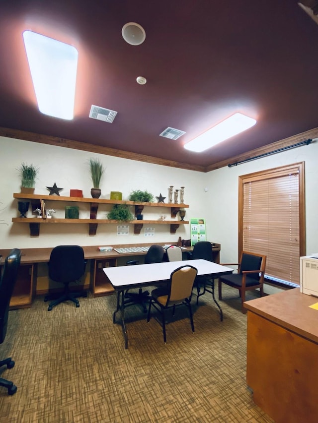 office space with visible vents and carpet floors