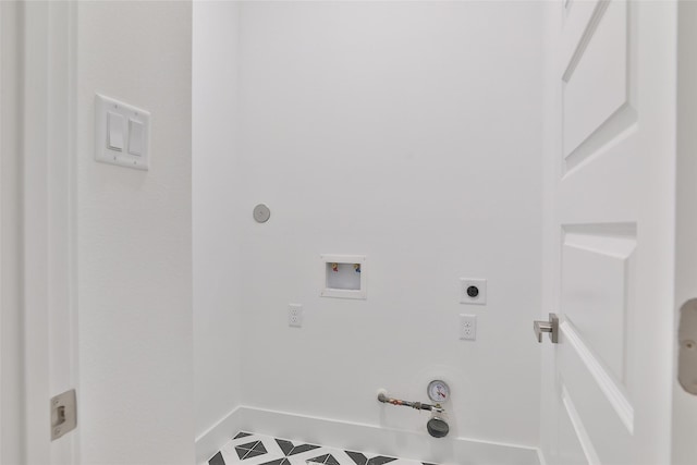 laundry room featuring laundry area, gas dryer hookup, baseboards, electric dryer hookup, and washer hookup