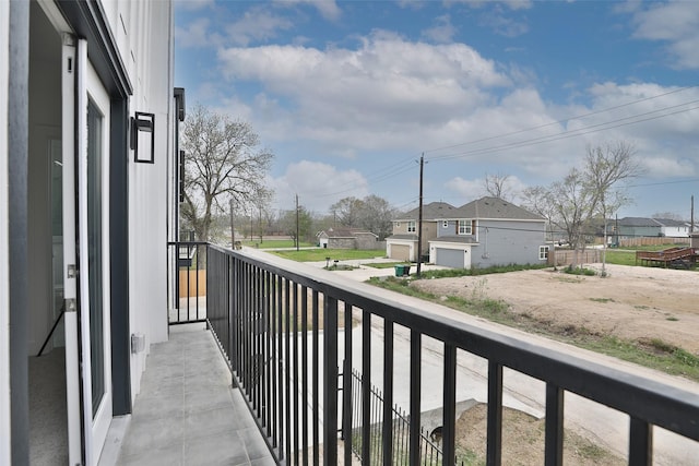 balcony featuring a residential view