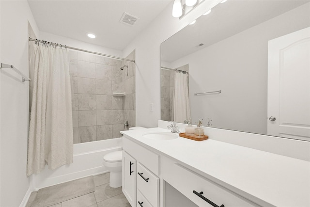 full bath with visible vents, toilet, tile patterned floors, shower / bath combination with curtain, and vanity