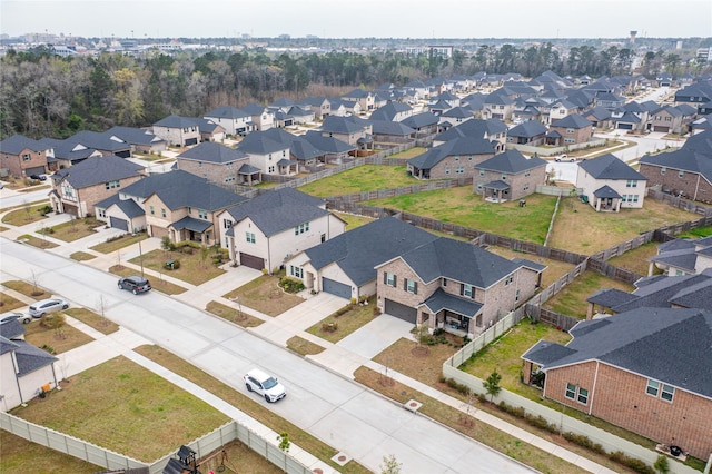 birds eye view of property with a residential view