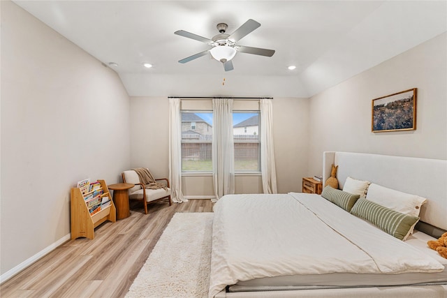 bedroom with light wood finished floors, baseboards, lofted ceiling, recessed lighting, and a ceiling fan