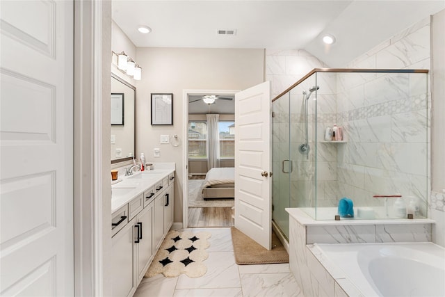 full bathroom with a bath, visible vents, a stall shower, and double vanity