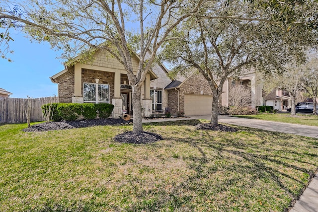 view of front of property with fence, concrete driveway, a front yard, a garage, and brick siding