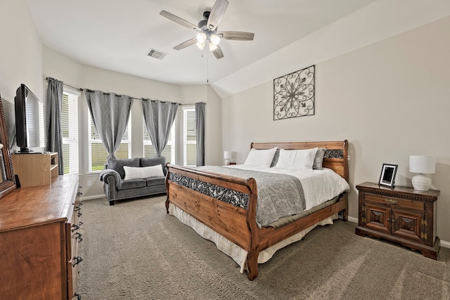 bedroom with a ceiling fan, baseboards, visible vents, lofted ceiling, and light carpet