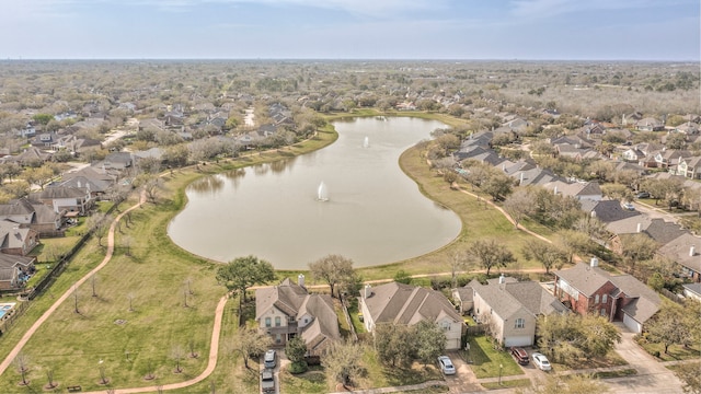 aerial view with a residential view and a water view