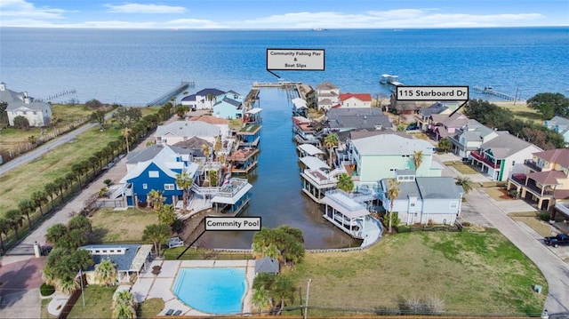 aerial view featuring a residential view and a water view