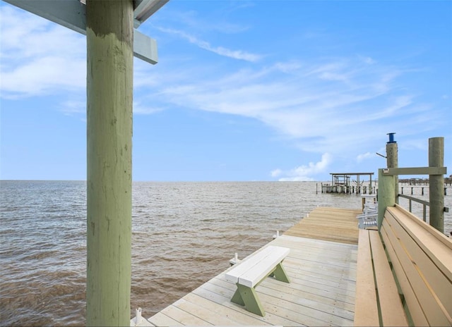 dock area featuring a water view