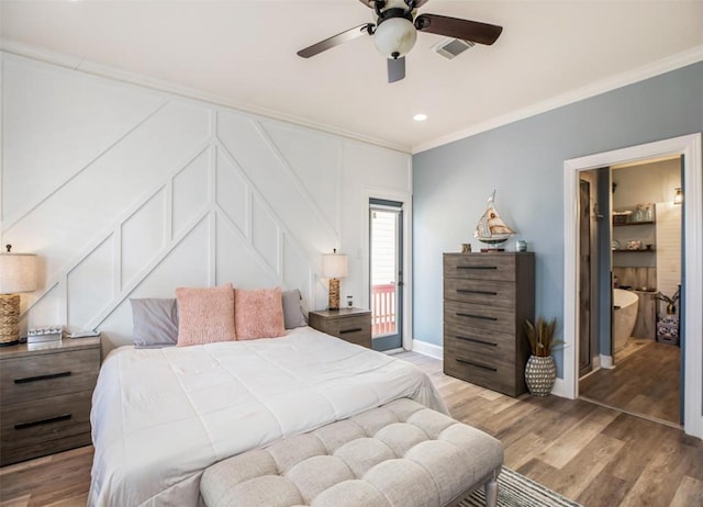 bedroom featuring crown molding, baseboards, visible vents, and light wood-type flooring