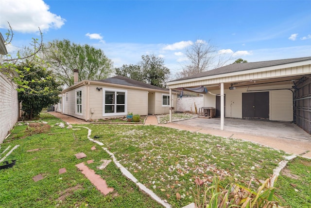 16123 Ridgegreen Dr, Houston, TX 77082 - rear view of property with fence, a patio area, and a lawn