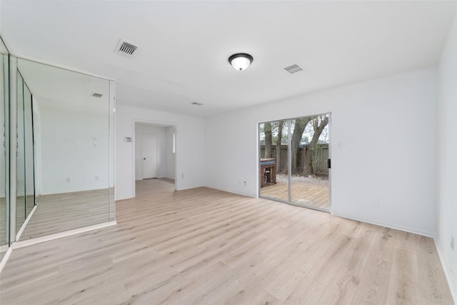 16123 Ridgegreen Dr, Houston, TX 77082 - spare room with visible vents, baseboards, and light wood finished floors