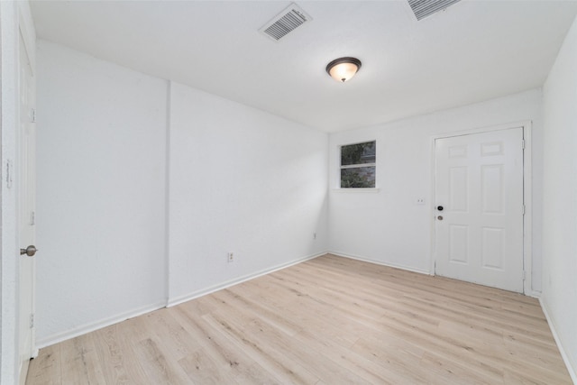 16123 Ridgegreen Dr, Houston, TX 77082 - unfurnished room featuring baseboards, visible vents, and light wood finished floors