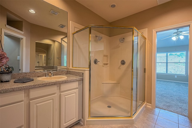 bathroom with tile patterned flooring, a stall shower, vanity, a ceiling fan, and recessed lighting