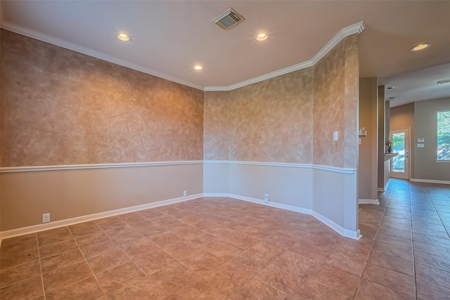 tiled empty room with recessed lighting, baseboards, and crown molding