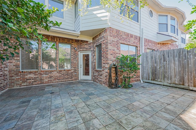 view of patio with fence