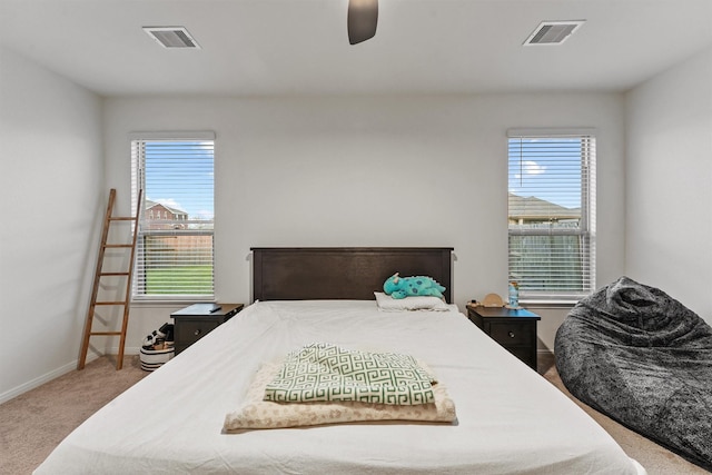 bedroom with visible vents, ceiling fan, baseboards, and carpet floors