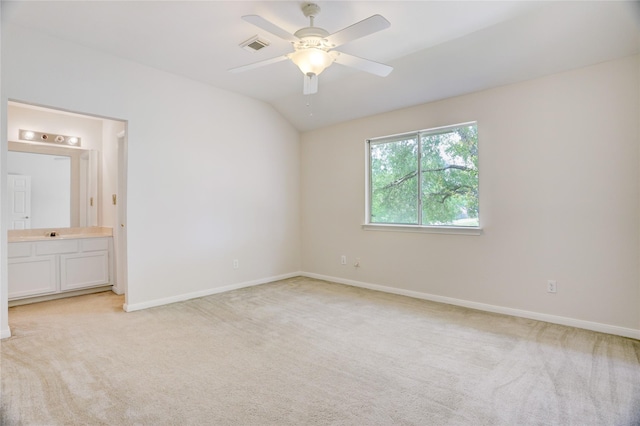 unfurnished bedroom featuring baseboards and light carpet