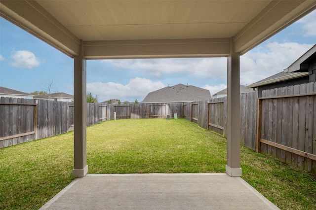 view of yard featuring a patio and a fenced backyard