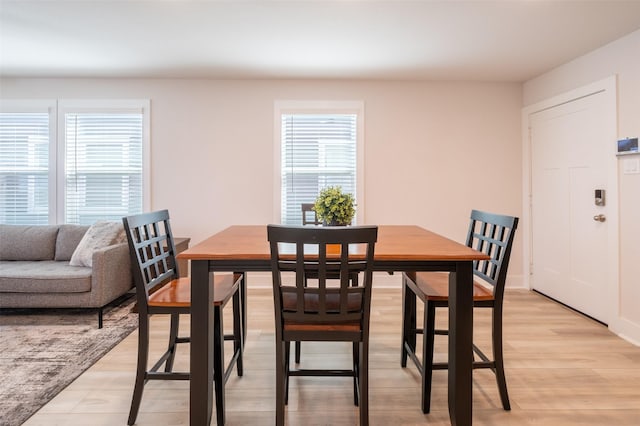 dining room featuring light wood-style flooring