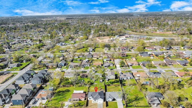 birds eye view of property with a residential view